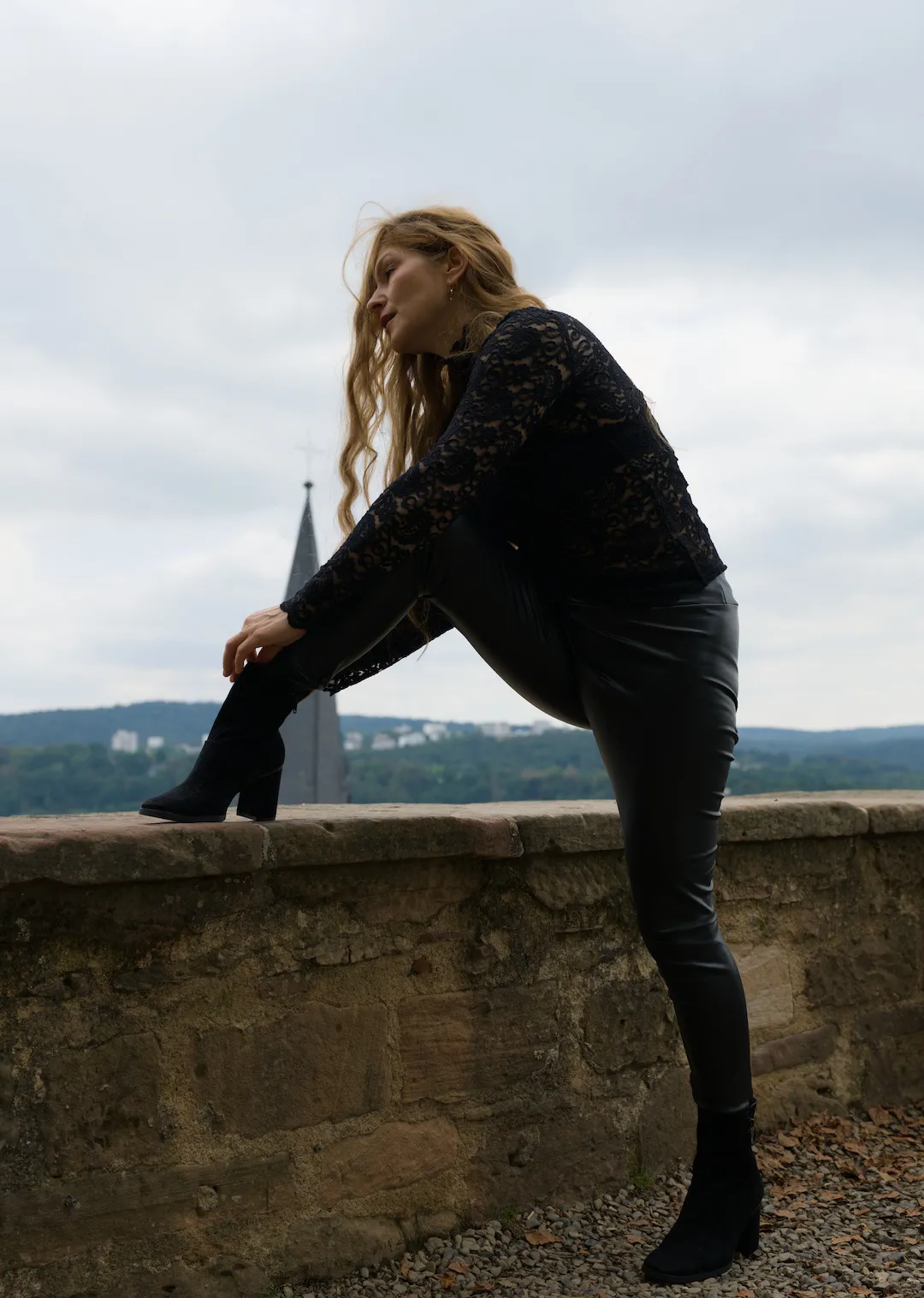 High-fashion editorial portrait at Marburg Castle